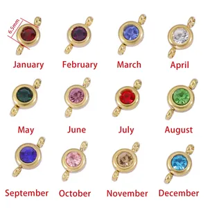Detailed view of 12 birthstone crystal charms in golden stainless steel for DIY jewelry
