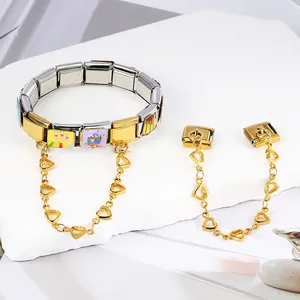 Detailed view of stainless steel Italian charm bracelet with heart pendant and modular links
