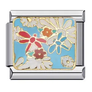 Macro detail of Italian modular charm with dragonfly and floral enamel pattern.