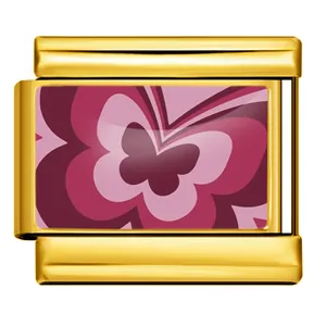 Close-up detail of a gold-plated Italian charm link featuring a pink butterfly pattern.