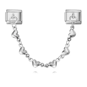Detailed macro view of silver heart charm chain for DIY Italian modular bracelets
