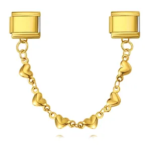 Close-up detail of a gold heart safety chain for DIY Italian modular charm bracelets