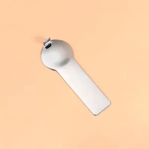 Close-up of stainless steel tool for Italian charm bracelet assembly