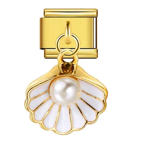 Detailed view of golden shell charm with pearl for Italian modular bracelet