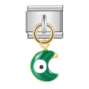Close-up detail of green crescent moon evil eye charm for Italian modular bracelet