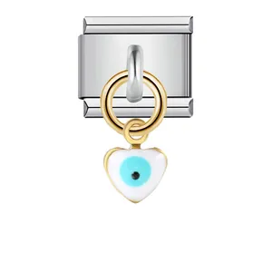 Detail view of Italian modular link charm with dangling heart-shaped evil eye pendant