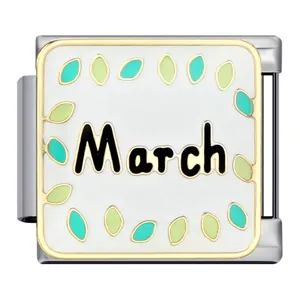 Detailed close-up of a square Italian charm link with March text and green leaves.
