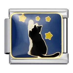 Macro view of blue enamel Italian charm featuring a black cat and yellow stars motif