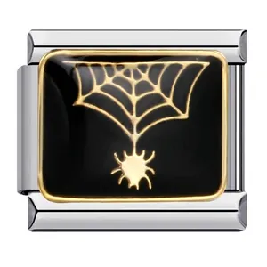 Detailed view of DIY Italian charm link featuring gold spider web on black enamel