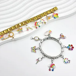 Italian modular charm bracelets in gold and silver with colorful cartoon enamel pendants.