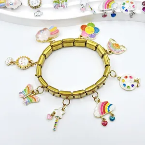 Gold Italian modular bracelet featuring colorful cartoon enamel charms for a playful look