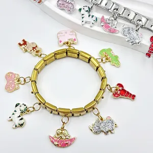 Gold Italian charm bracelet featuring cute colorful enamel animal charm pendants