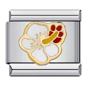 Close-up of a stainless steel Italian modular charm with a white enamel hibiscus flower.