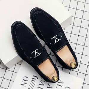 Men's black suede pointed toe loafers with silver V-buckle detail