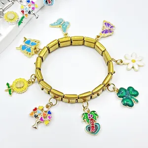 Bracciale componibile stile italiano dorato con ciondoli colorati a farfalla e fiori