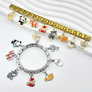 Italian charm bracelets with colorful enamel animal charms on a textured white background.