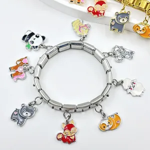Detail view of an Italian modular bracelet featuring colorful animal enamel charms.