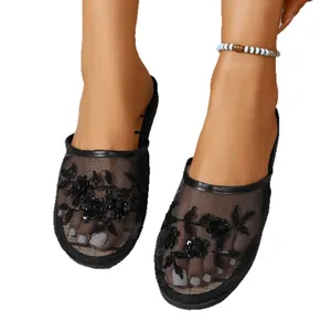 Elegant black mesh embroidered floral mules with flat sole and breathable design
