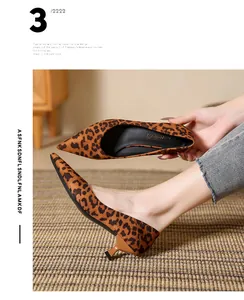 Detail showing leopard print pointed-toe kitten heel pumps with suede finish