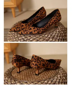 Stylish leopard print pointed-toe pumps featuring a mid-heel and soft suede finish for women