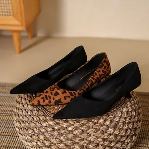 Elegant pointed toe kitten heel suede pumps in leopard print and classic black.
