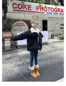 Cozy camel platform snow boots with fur trim shown in a stylish street scene