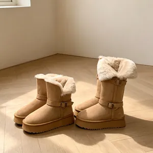 Warm camel platform snow boots with plush faux fur lining and stylish buckle detail