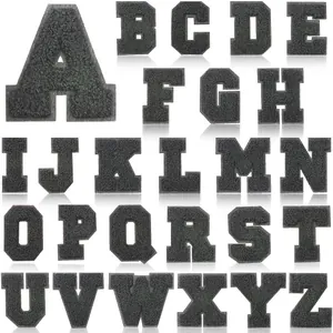 Full set of 26 black chenille embroidered letter patches A-Z for iron-on decoration.