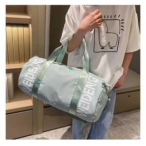 Borsa da yoga e sport cilindrica azzurra capiente con logo WEIDENG per viaggi e palestra