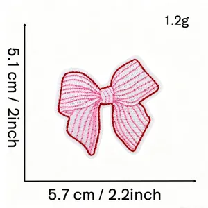 Dimensions of a pink bow embroidery patch: 5.7 x 5.1 cm with striped texture detail.