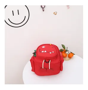 Mochila de dinosaurio roja para niños pequeños con arnés de seguridad