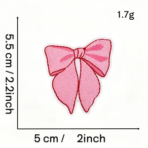 Detailed view of pink bow embroidered patch showing 5x5.5cm dimensions and 1.7g weight