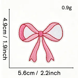 Pink bow embroidered patch with dimensions 5.6cm x 4.9cm for DIY apparel decoration