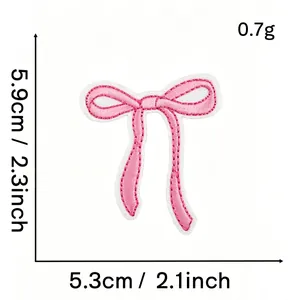 Detailed dimensions of pink bow embroidery patch showing 5.3cm x 5.9cm and 0.7g weight
