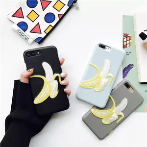 Detailed view of yellow banana embroidered patches for DIY phone case decor