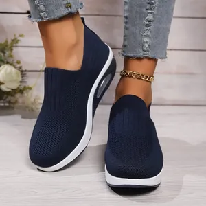 Detailed view of breathable navy blue knitted slip-on walking shoes with air cushion