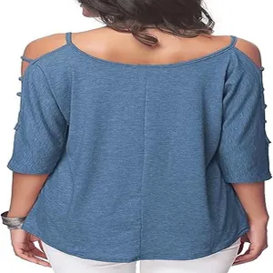 Back view of a women's cold-shoulder blue T-shirt with mid-length sleeves