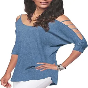 Close-up of blue cold shoulder T-shirt with cutout sleeve detail