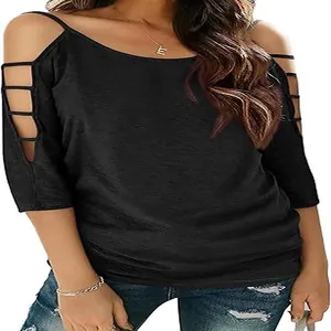Close-up detail of women's black cold shoulder t-shirt with strap cut-out sleeve design