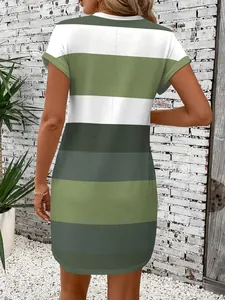 Back view of a casual green and white striped short-sleeve mini T-shirt dress for women