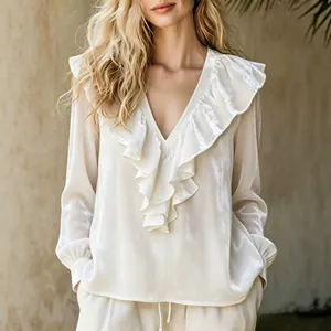 Elegant cream velvet V-neck blouse with ruffle trim and long lantern sleeves for women