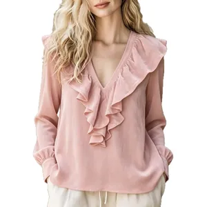 Elegant pink velvet V-neck blouse with decorative ruffles and long sleeves