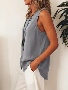 Side view detail of grey sleeveless single-breasted loose casual blouse top for women