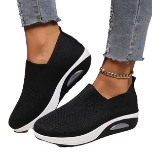 Women's black breathable fly-knit platform sneakers with air cushion slip-on style