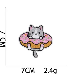 Detailed embroidery patch featuring a cute cat in a pink donut, 7x7cm, 2.4g weight.