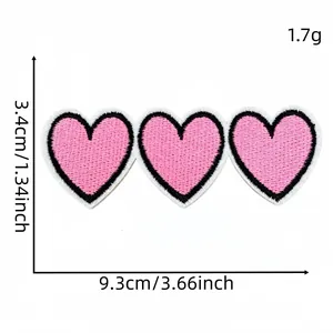 Detailed view showing measurements for three linked pink heart iron-on embroidery patches