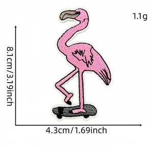 Pink flamingo on skateboard embroidery patch with dimensions 8.1x4.3cm and 1.1g weight