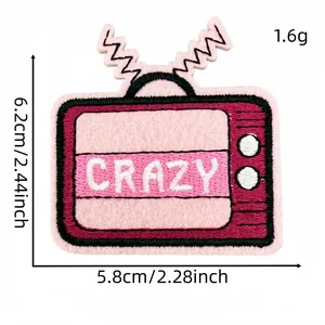 Detail view of a pink cartoon TV embroidered patch with dimensions and weight info.