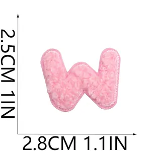 Macro view of pink chenille letter W embroidered patch showing 2.5x2.8cm dimensions