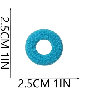 Detailed view of small blue chenille circle embroidery patch with 2.5cm 1in size labels